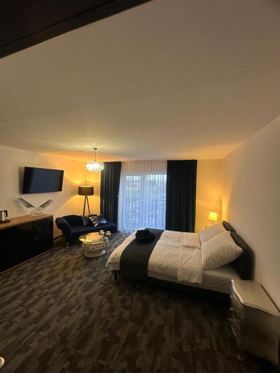 Postel nebo postele na pokoji v ubytování Marina Resort Chłopy
