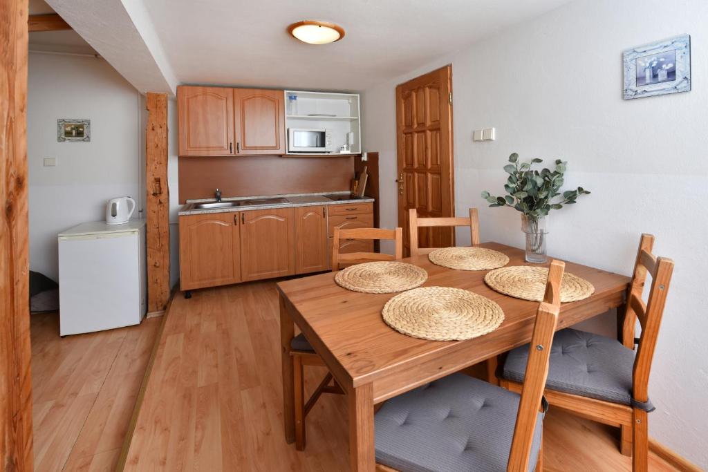 Kuchyň nebo kuchyňský kout v ubytování Apartmany ZEA