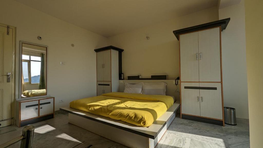 Postel nebo postele na pokoji v ubytování El Cielo, B&B