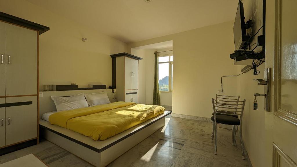 Postel nebo postele na pokoji v ubytování El Cielo, B&B