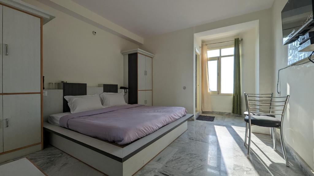 Postel nebo postele na pokoji v ubytování El Cielo, B&B