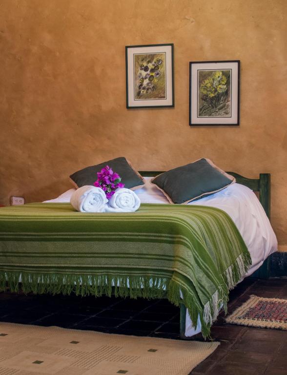 Postel nebo postele na pokoji v ubytování Hacienda San Francisco
