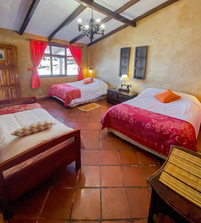 Postel nebo postele na pokoji v ubytování Hacienda San Francisco