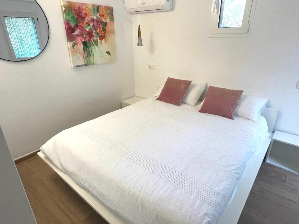 Postel nebo postele na pokoji v ubytování B&B Case Vacanza Orchidea marina di Macchia vicino a Mattinata Gargano