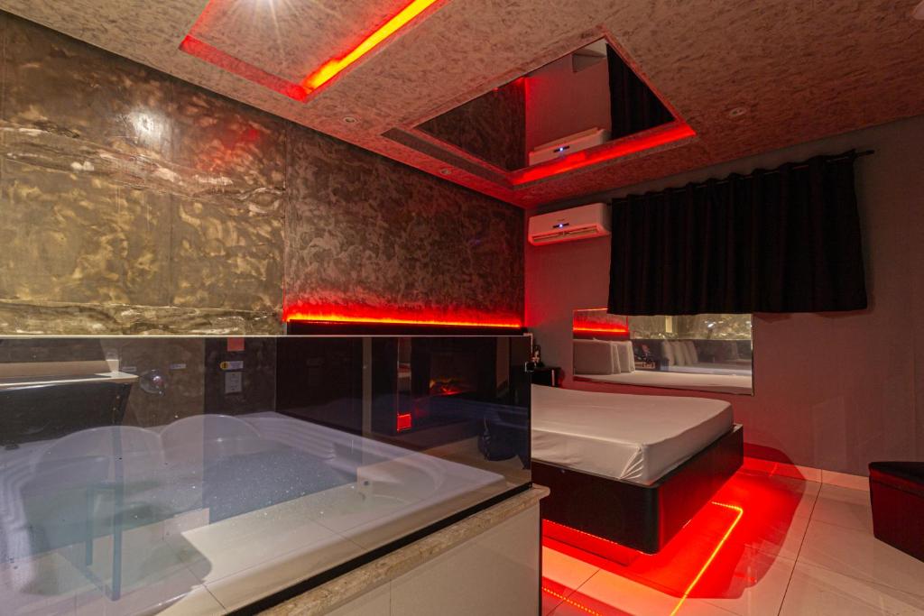 TV a/nebo společenská místnost v ubytování Point Motel GRU