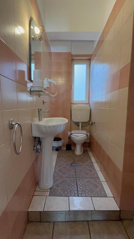 Koupelna v ubytování Hotel Ionion