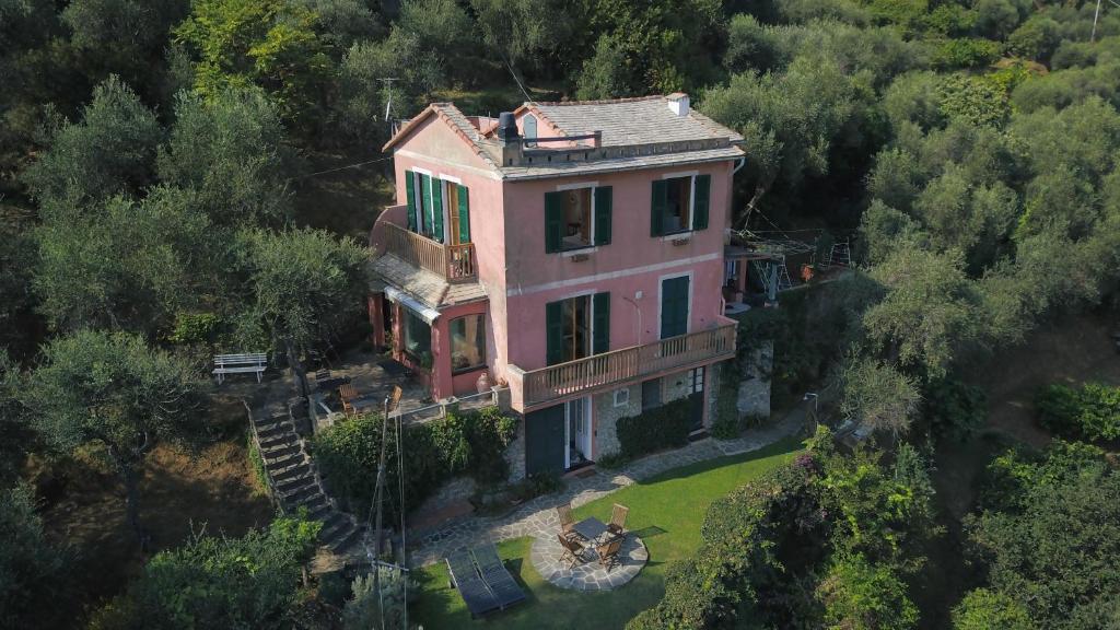 an aerial view of a pink house in the forest at B&B Portofino in Portofino