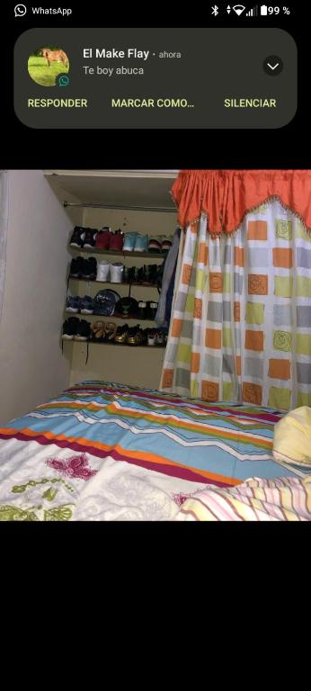 a picture of a bedroom with a bed and a closet at Welking jello in Guerra