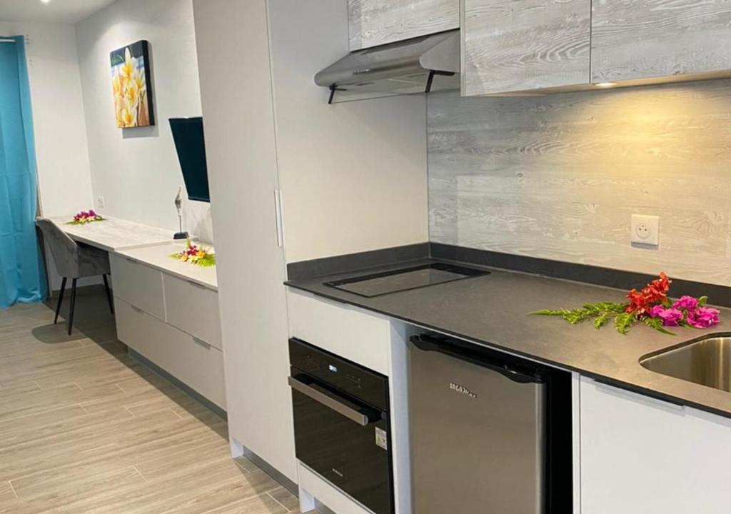 Cucina o angolo cottura di Mareta Lodge - studio TAHI 1