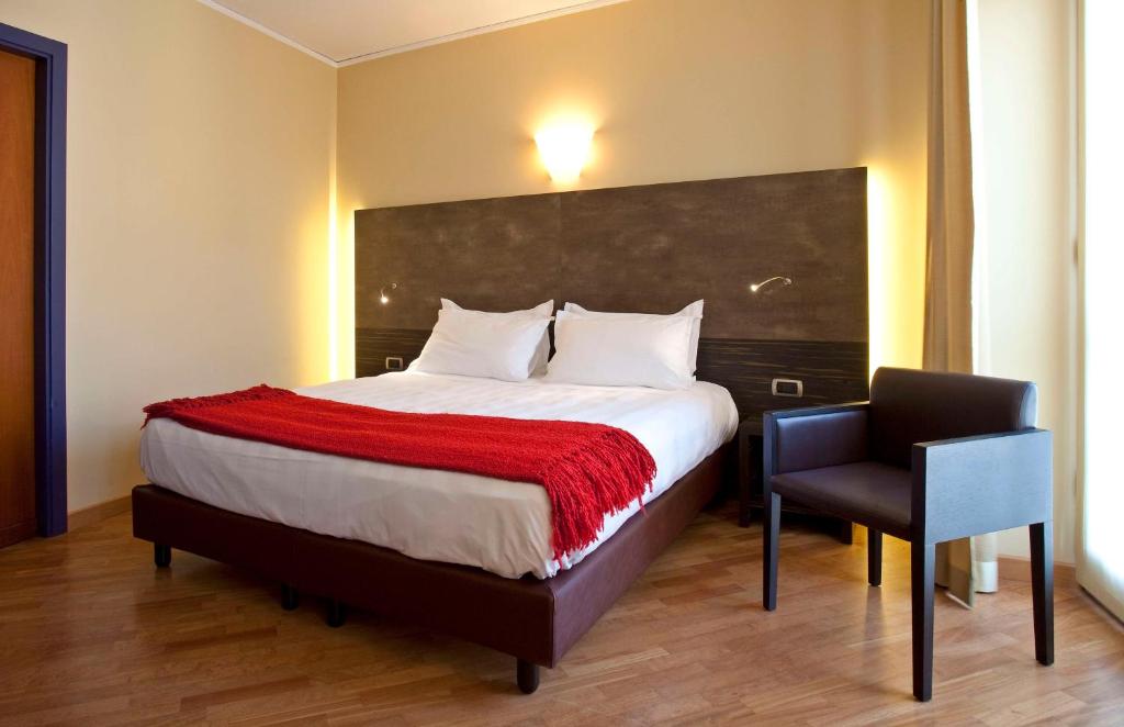 Postel nebo postele na pokoji v ubytování Best Western Hotel Metropoli