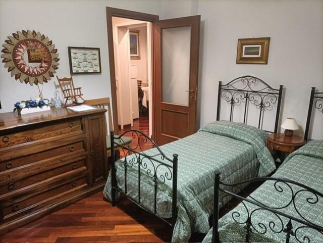 Ένα ή περισσότερα κρεβάτια σε δωμάτιο στο Dolce Risveglio vicino Milano