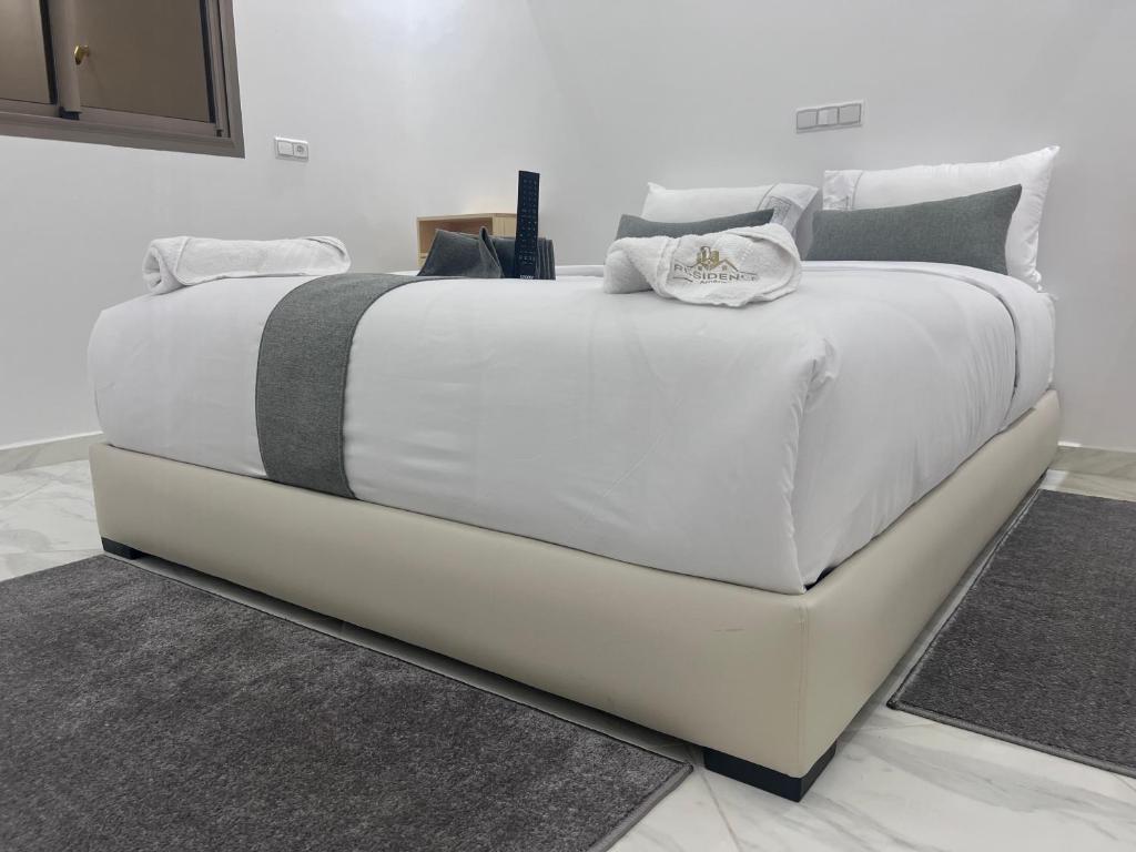 Postel nebo postele na pokoji v ubytování Hotel apartment america