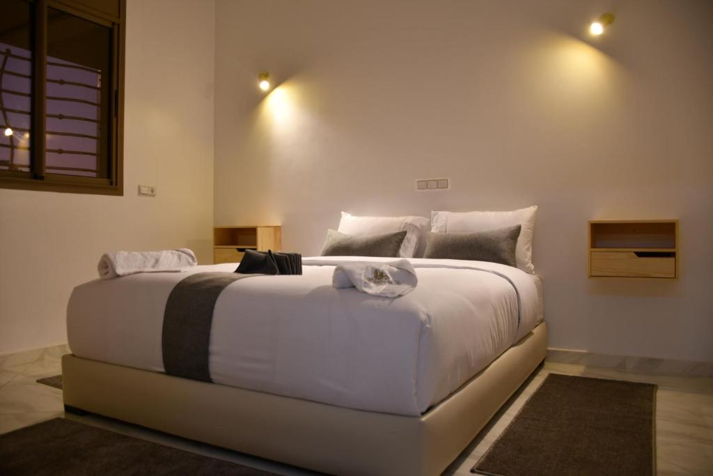 Postel nebo postele na pokoji v ubytování Hotel apartment america