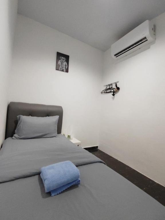 Postel nebo postele na pokoji v ubytování 184 GURNEY DRIVE PENANG
