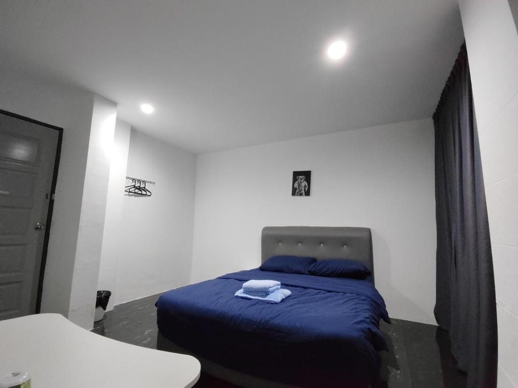 Postel nebo postele na pokoji v ubytování 184 GURNEY DRIVE PENANG