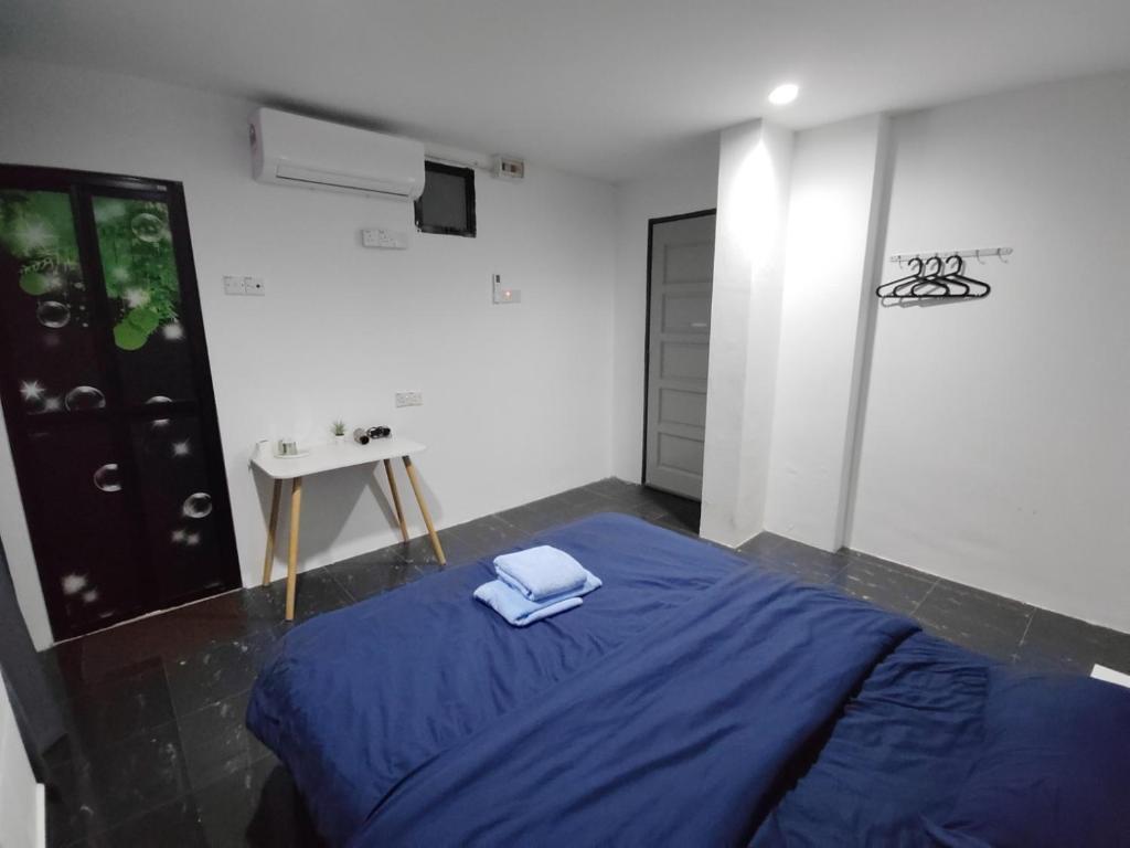 Postel nebo postele na pokoji v ubytování 184 GURNEY DRIVE PENANG