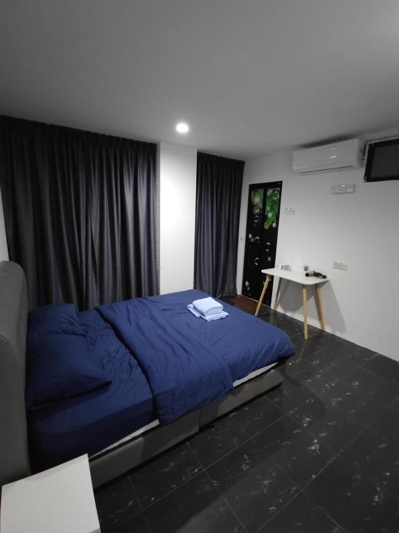Postel nebo postele na pokoji v ubytování 184 GURNEY DRIVE PENANG