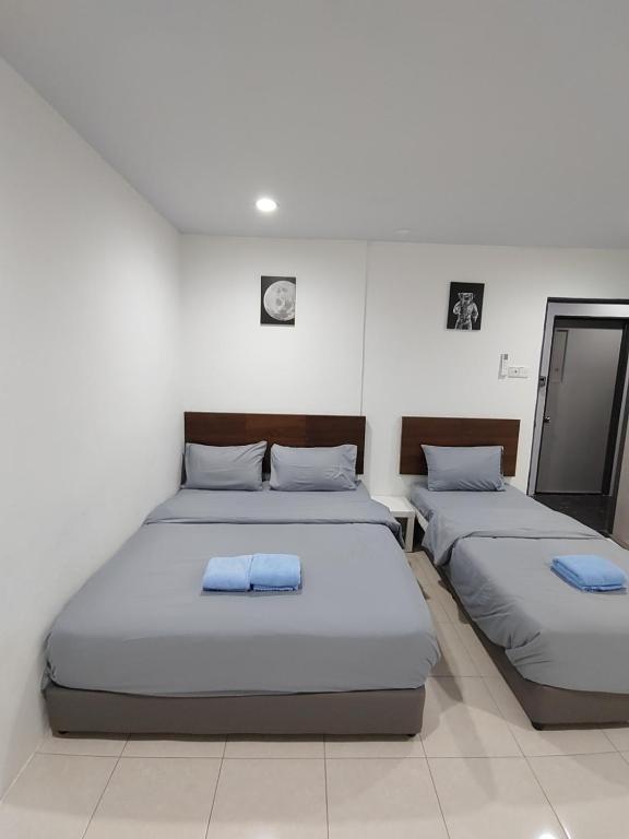 Postel nebo postele na pokoji v ubytování 184 GURNEY DRIVE PENANG