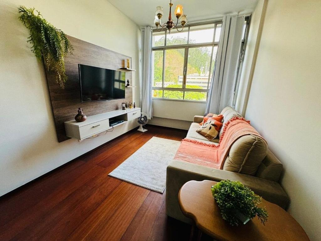 Μια τηλεόραση ή/και κέντρο ψυχαγωγίας στο Apartamento na General Osório