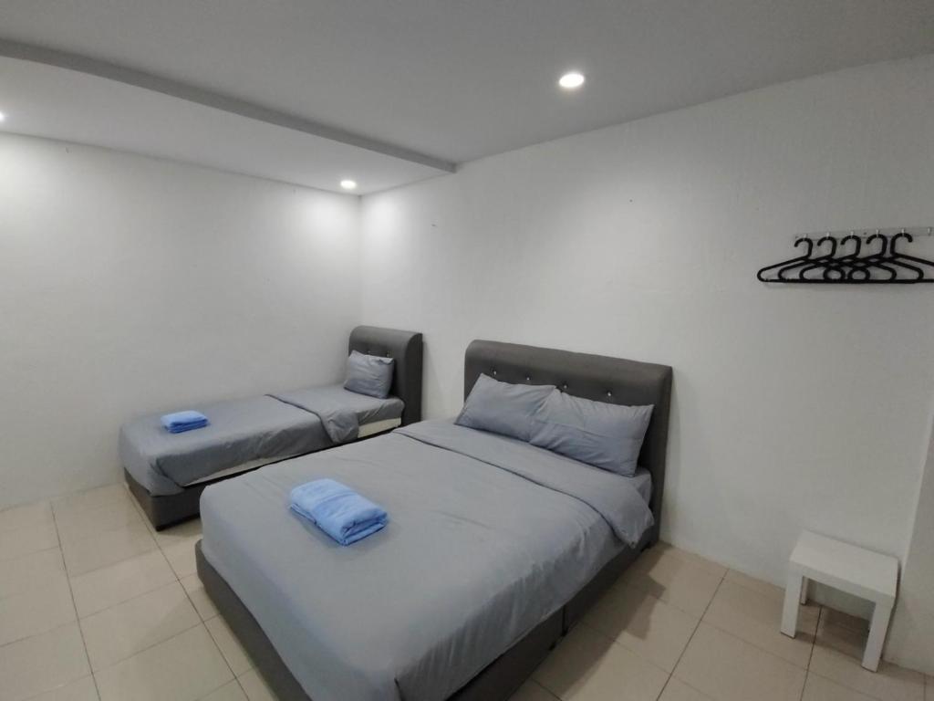 Postel nebo postele na pokoji v ubytování 184 GURNEY DRIVE PENANG