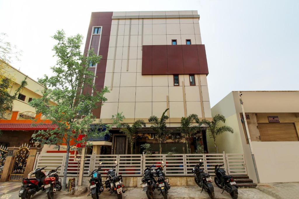 a group of motorcycles parked in front of a building at White Ridge in Upal