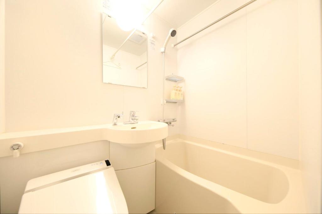 Koupelna v ubytování Hotel Shinjukuya