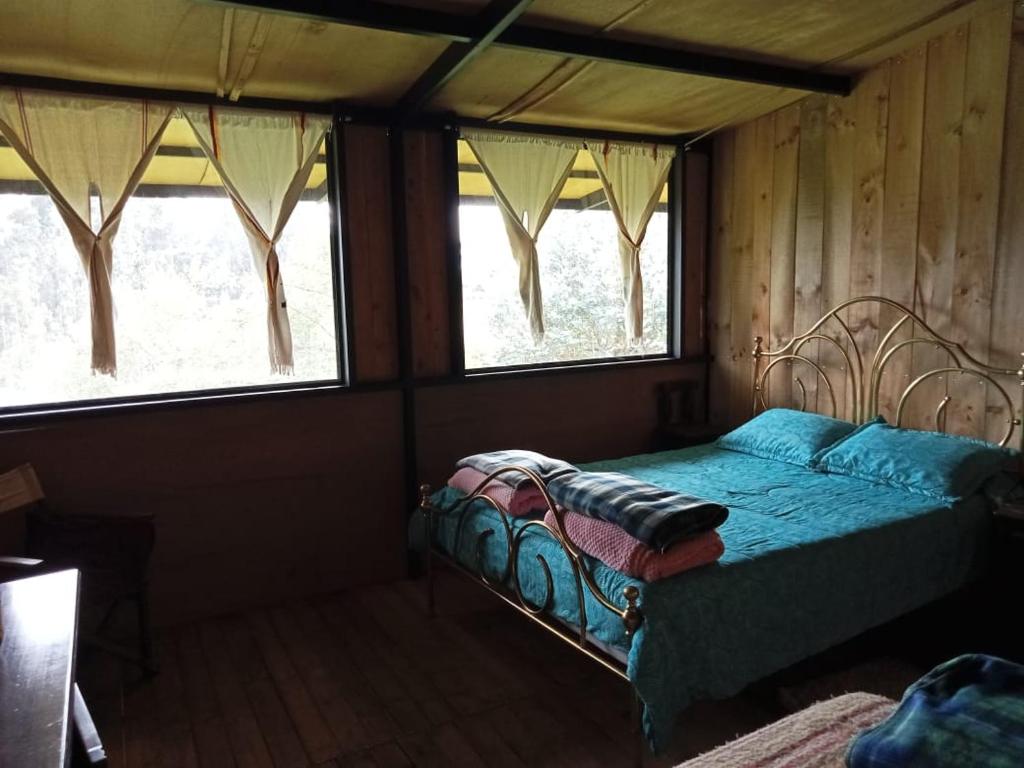 Postel nebo postele na pokoji v ubytování Posada Turistica Los Joseph