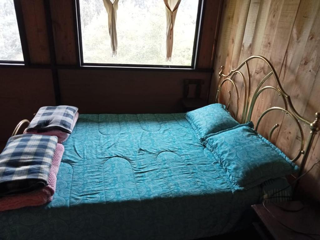 Postel nebo postele na pokoji v ubytování Posada Turistica Los Joseph