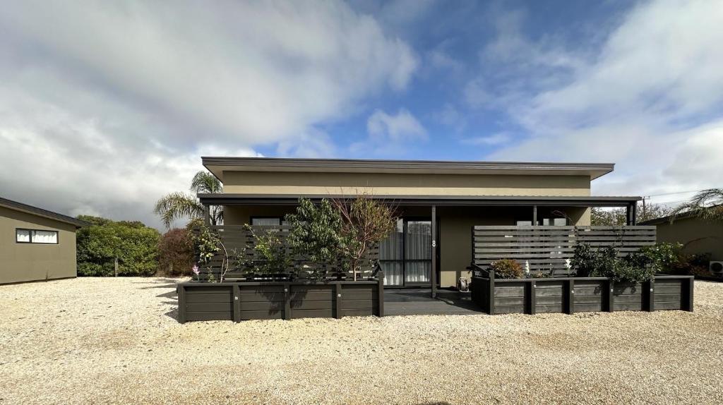 a house with some plants in front of it at Country Retreats on Ranzau 8 in Hope