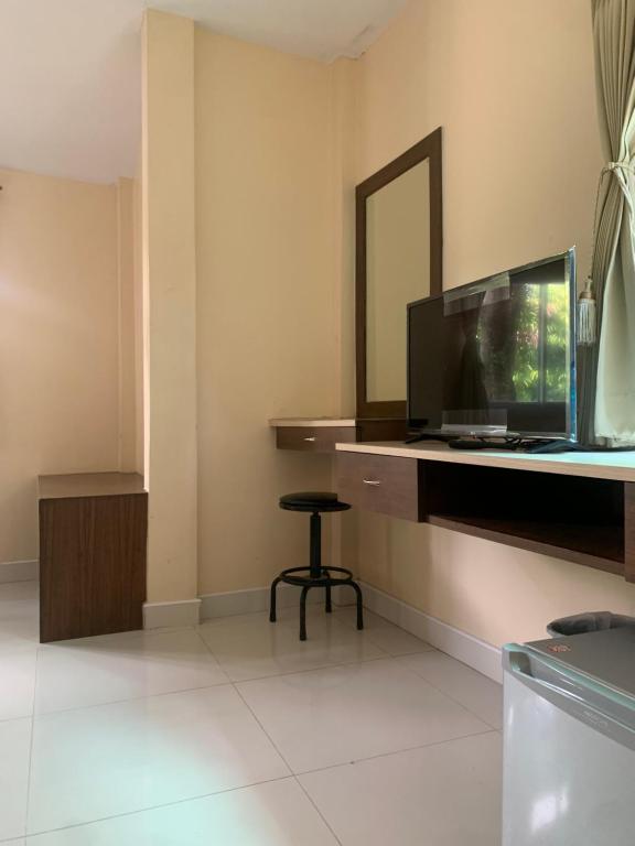 TV a/nebo společenská místnost v ubytování N.P.Place Resort&Hotel