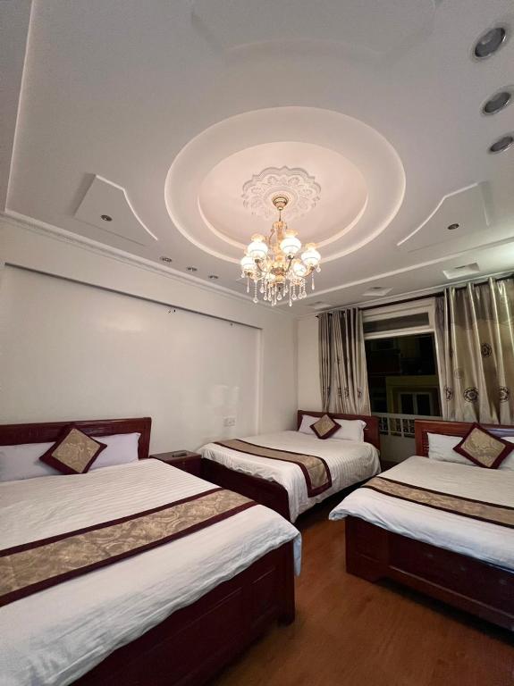 Postel nebo postele na pokoji v ubytování Dang Uyen 1 Hotel