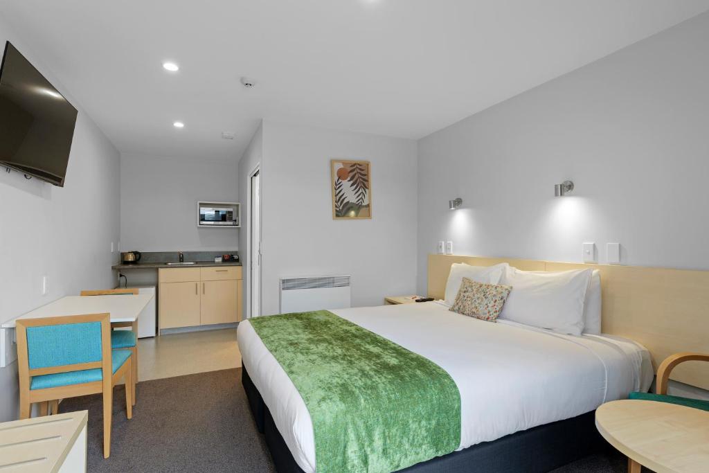 Postel nebo postele na pokoji v ubytování Bella Vista Motel & Apartments Christchurch