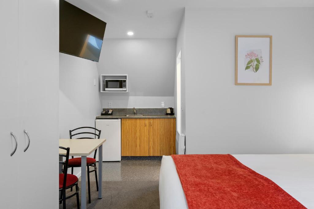 Kuchyň nebo kuchyňský kout v ubytování Bella Vista Motel & Apartments Christchurch