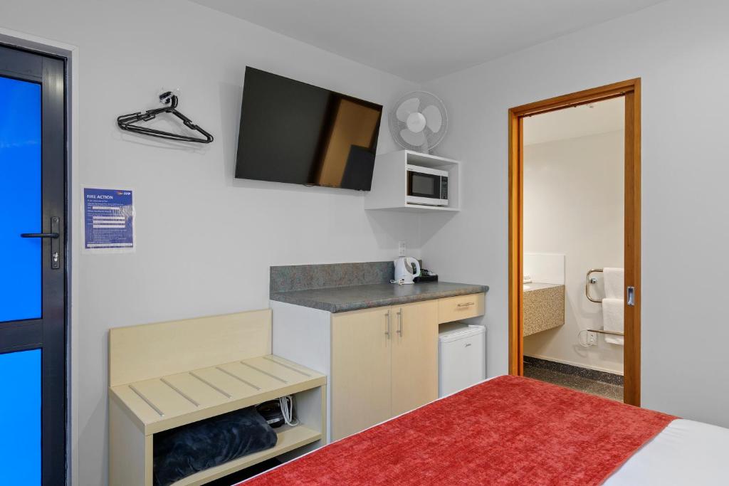 Kuchyň nebo kuchyňský kout v ubytování Bella Vista Motel & Apartments Christchurch