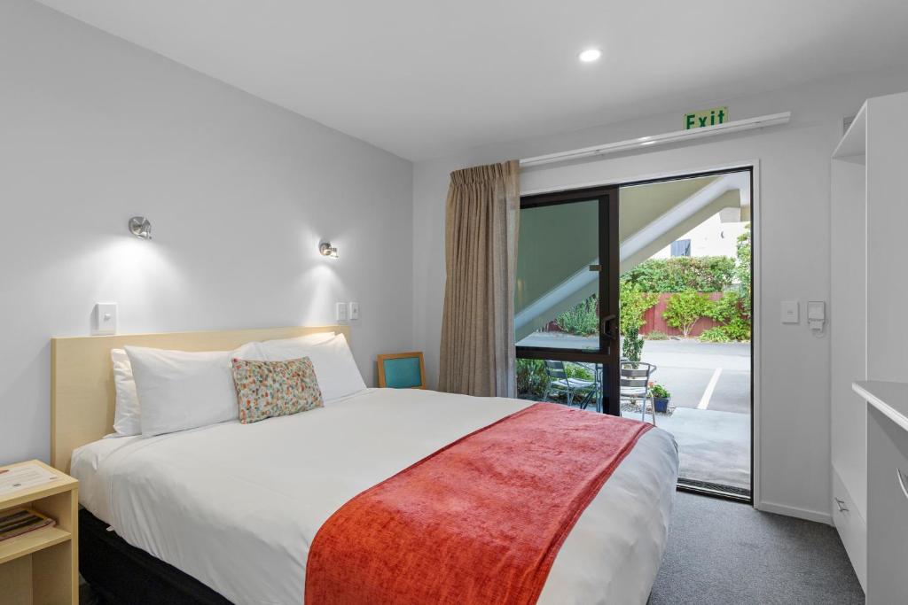 Postel nebo postele na pokoji v ubytování Bella Vista Motel & Apartments Christchurch