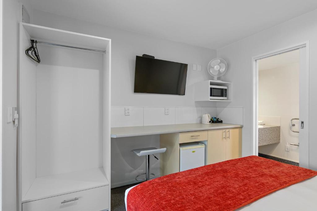 Postel nebo postele na pokoji v ubytování Bella Vista Motel & Apartments Christchurch