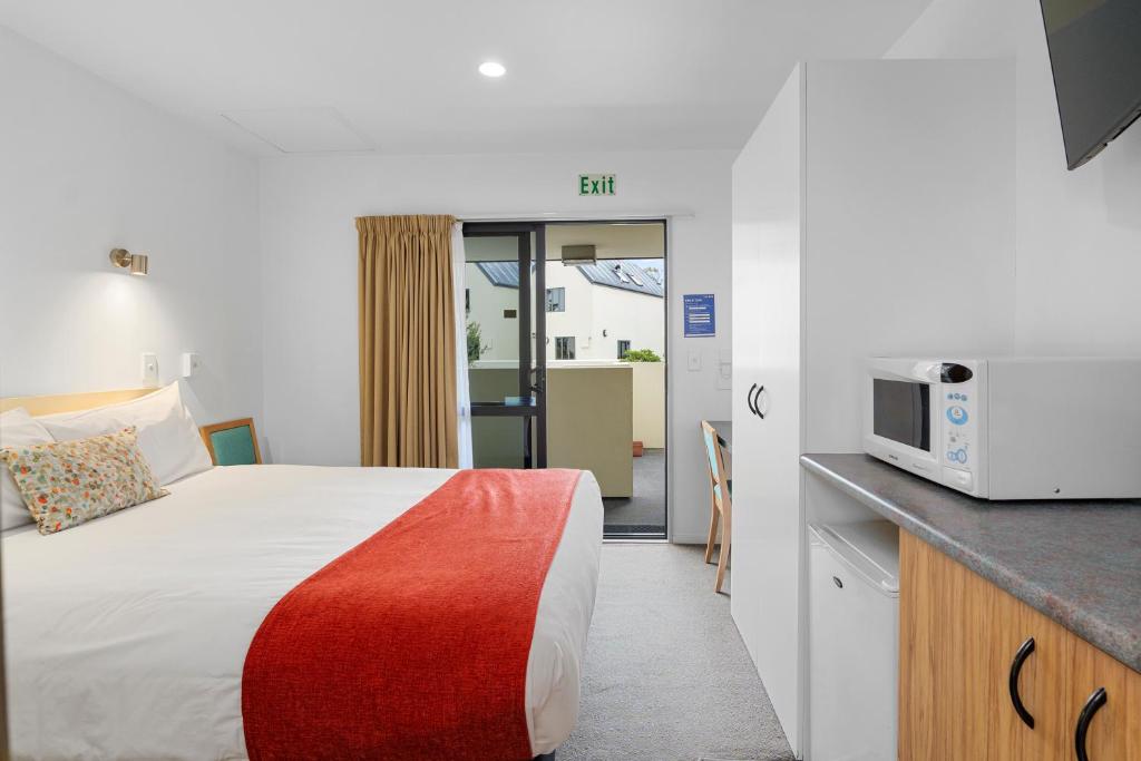 Postel nebo postele na pokoji v ubytování Bella Vista Motel & Apartments Christchurch