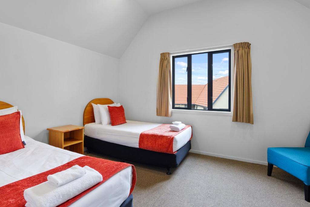 Postel nebo postele na pokoji v ubytování Bella Vista Motel & Apartments Christchurch
