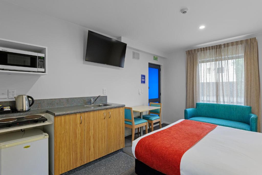 Kuchyň nebo kuchyňský kout v ubytování Bella Vista Motel & Apartments Christchurch