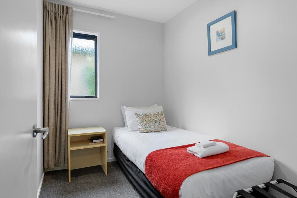 Postel nebo postele na pokoji v ubytování Bella Vista Motel & Apartments Christchurch