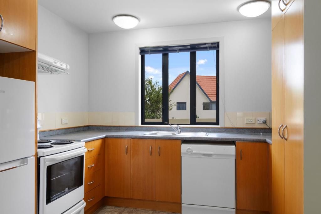 Kuchyň nebo kuchyňský kout v ubytování Bella Vista Motel & Apartments Christchurch