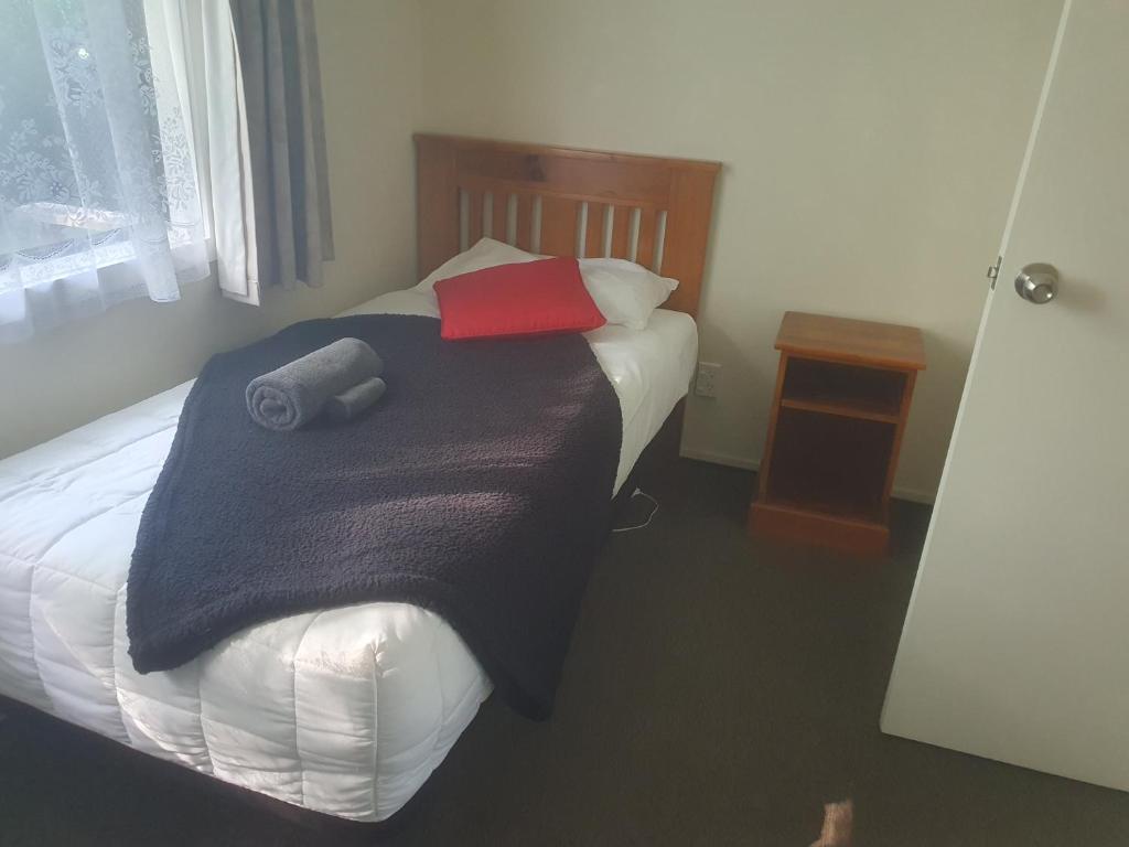 Postel nebo postele na pokoji v ubytování Geraldine Motels