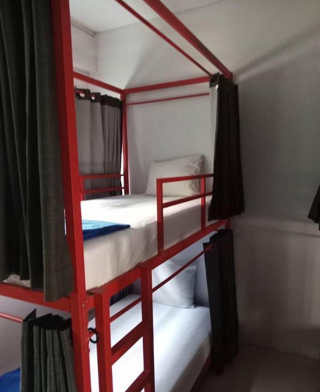 Postel nebo postele na pokoji v ubytování Slumber Resort Koh Chang