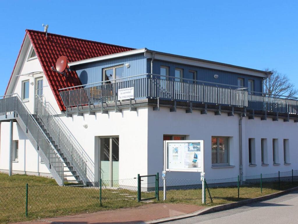 a building with a staircase on the side of it at Chudzik Modern retreat in Rerik