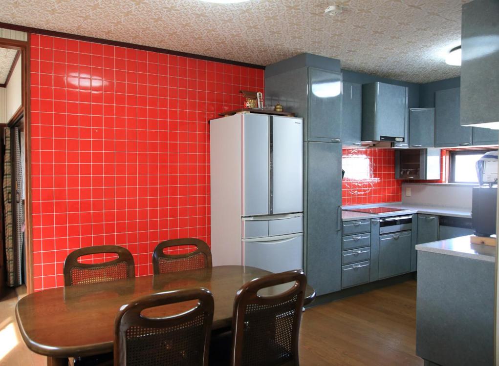 Kuchyň nebo kuchyňský kout v ubytování 上田屋　半田館