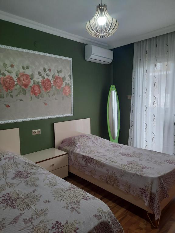 Postel nebo postele na pokoji v ubytování Villa NiNo