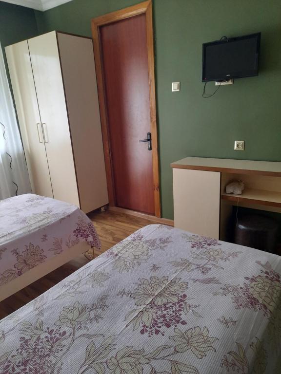 Postel nebo postele na pokoji v ubytování Villa NiNo