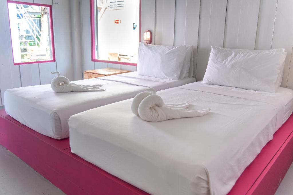 Postel nebo postele na pokoji v ubytování Slumber Resort Koh Chang