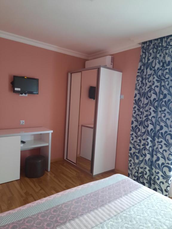TV a/nebo společenská místnost v ubytování Villa NiNo
