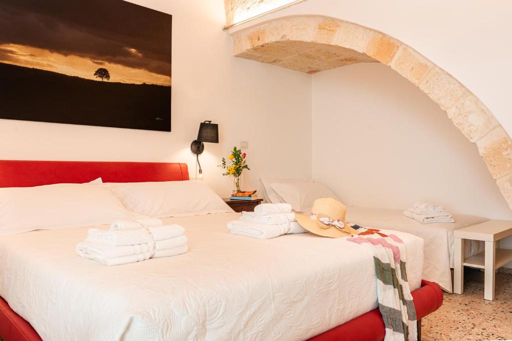 Postel nebo postele na pokoji v ubytování La casa di Benedetta